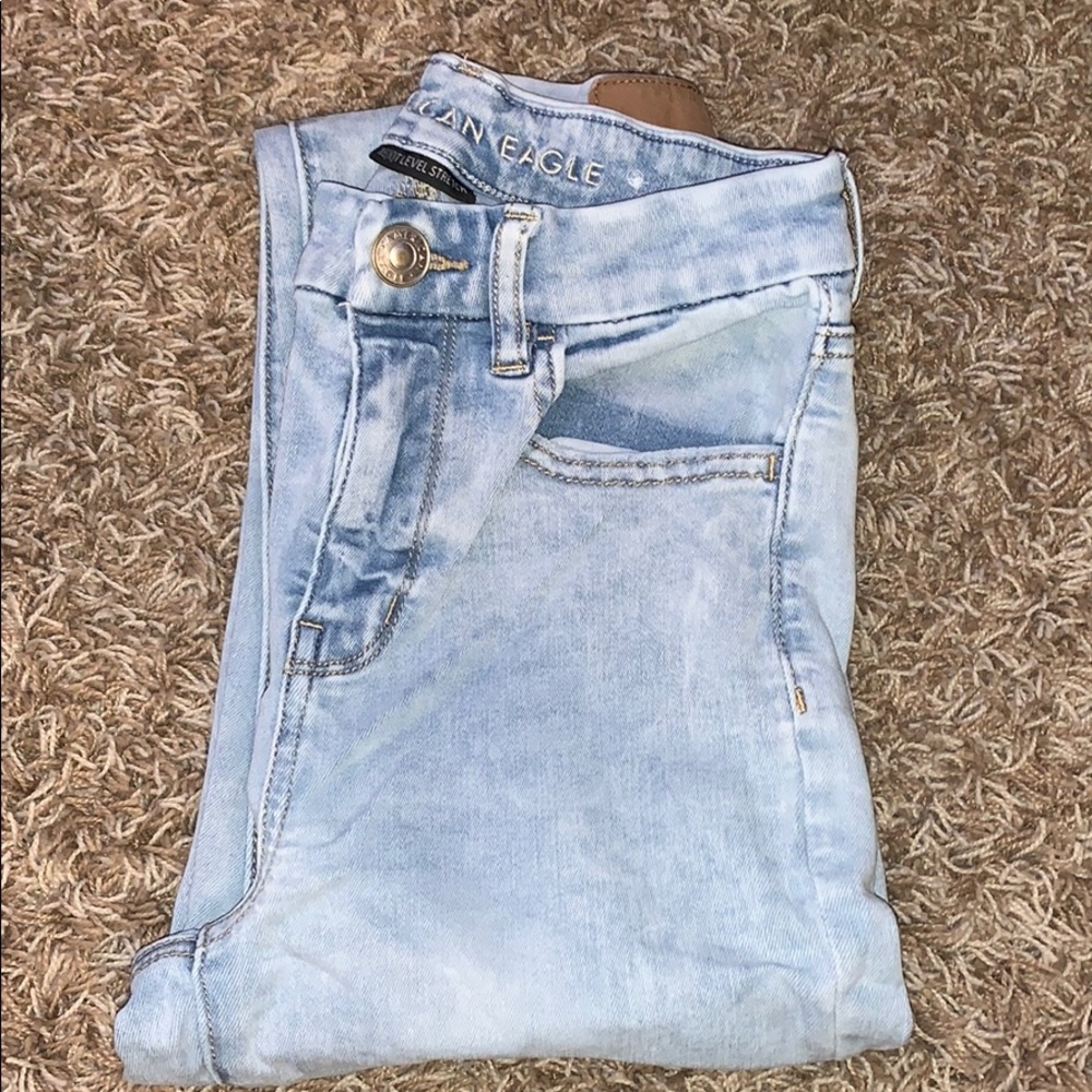 Light blue ripped jeans